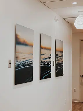 Artwork hanging in our Ormond Beach office